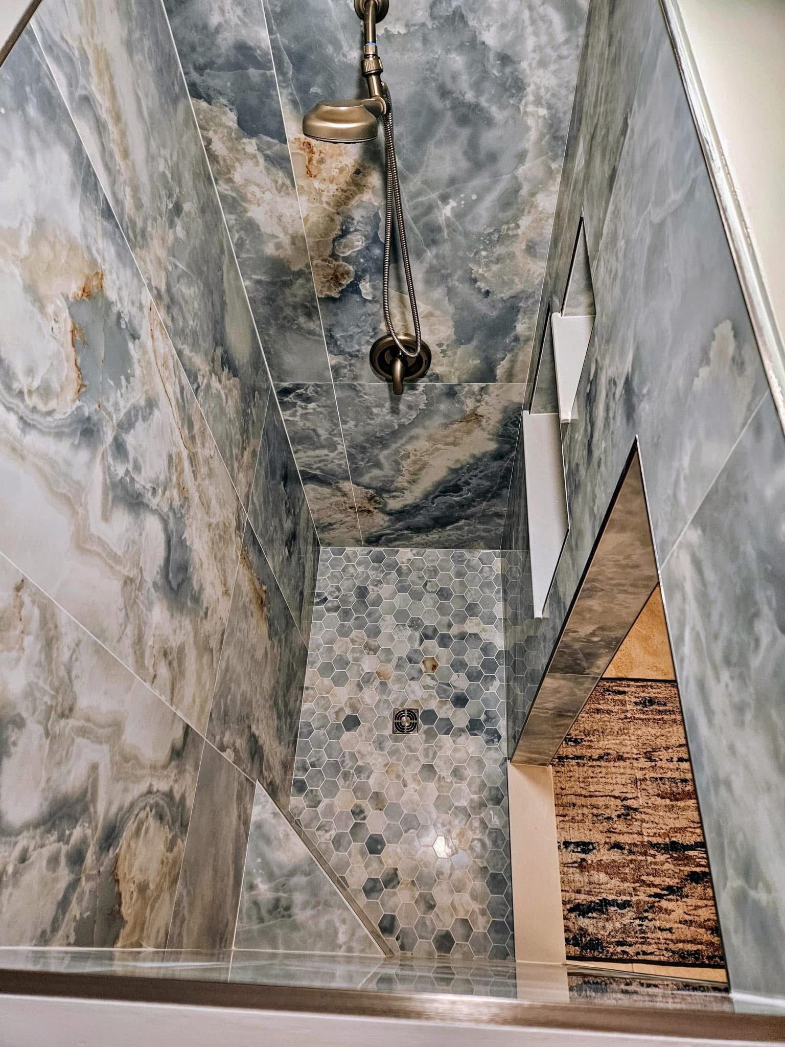 Blue marble tile shower