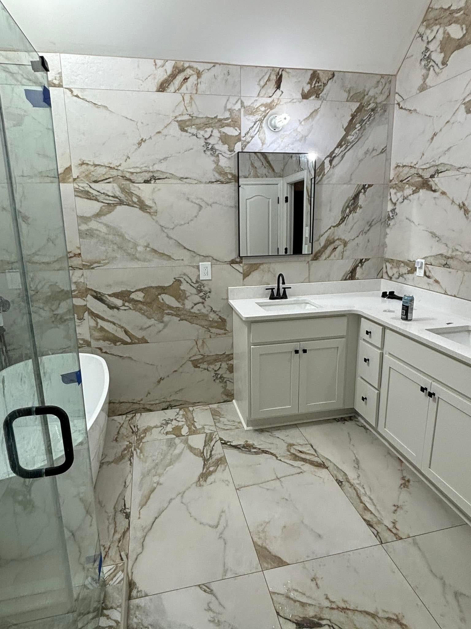 Marble slab tile bathroom with white vanity