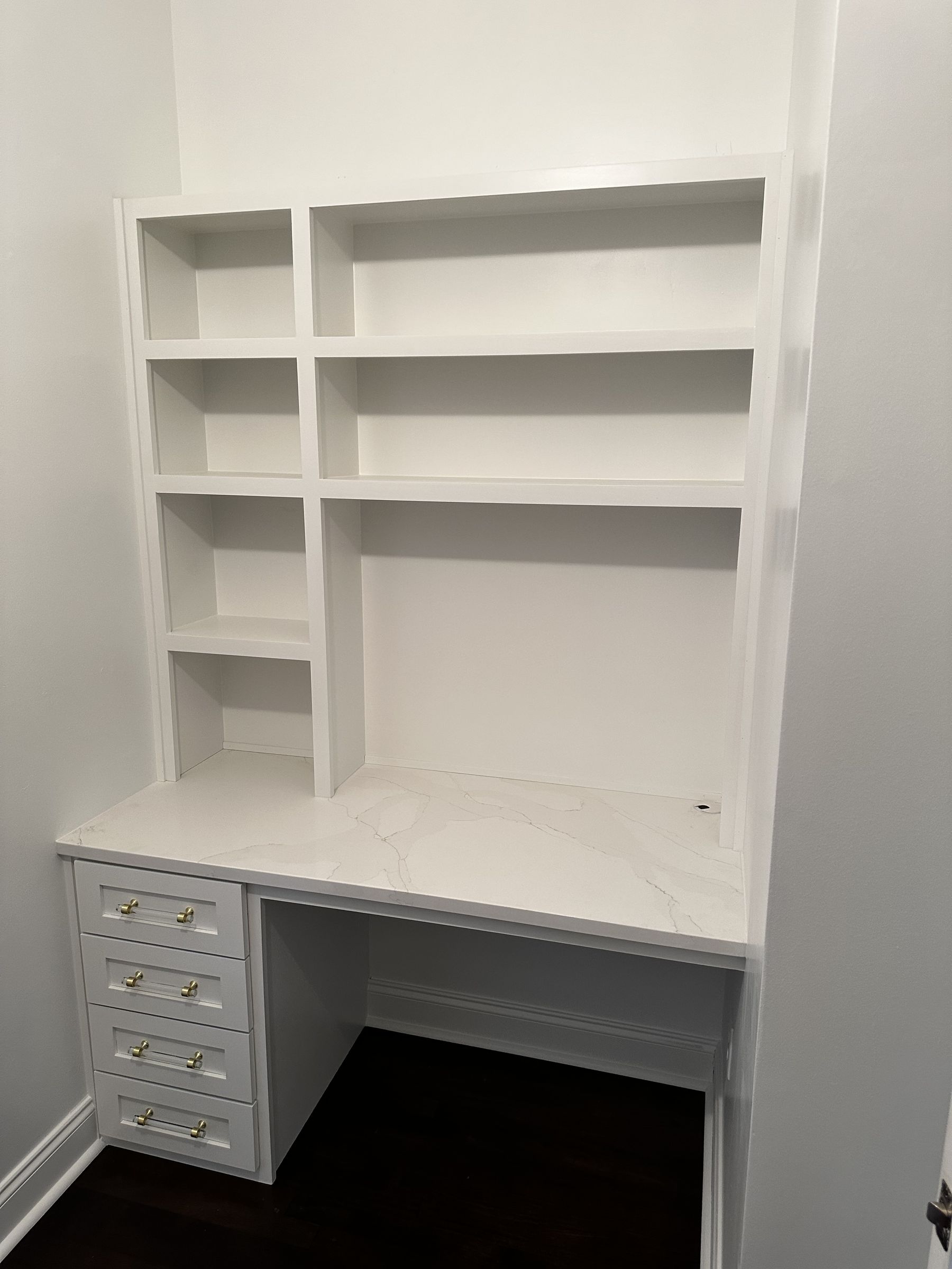 Corner shelving with marble counter